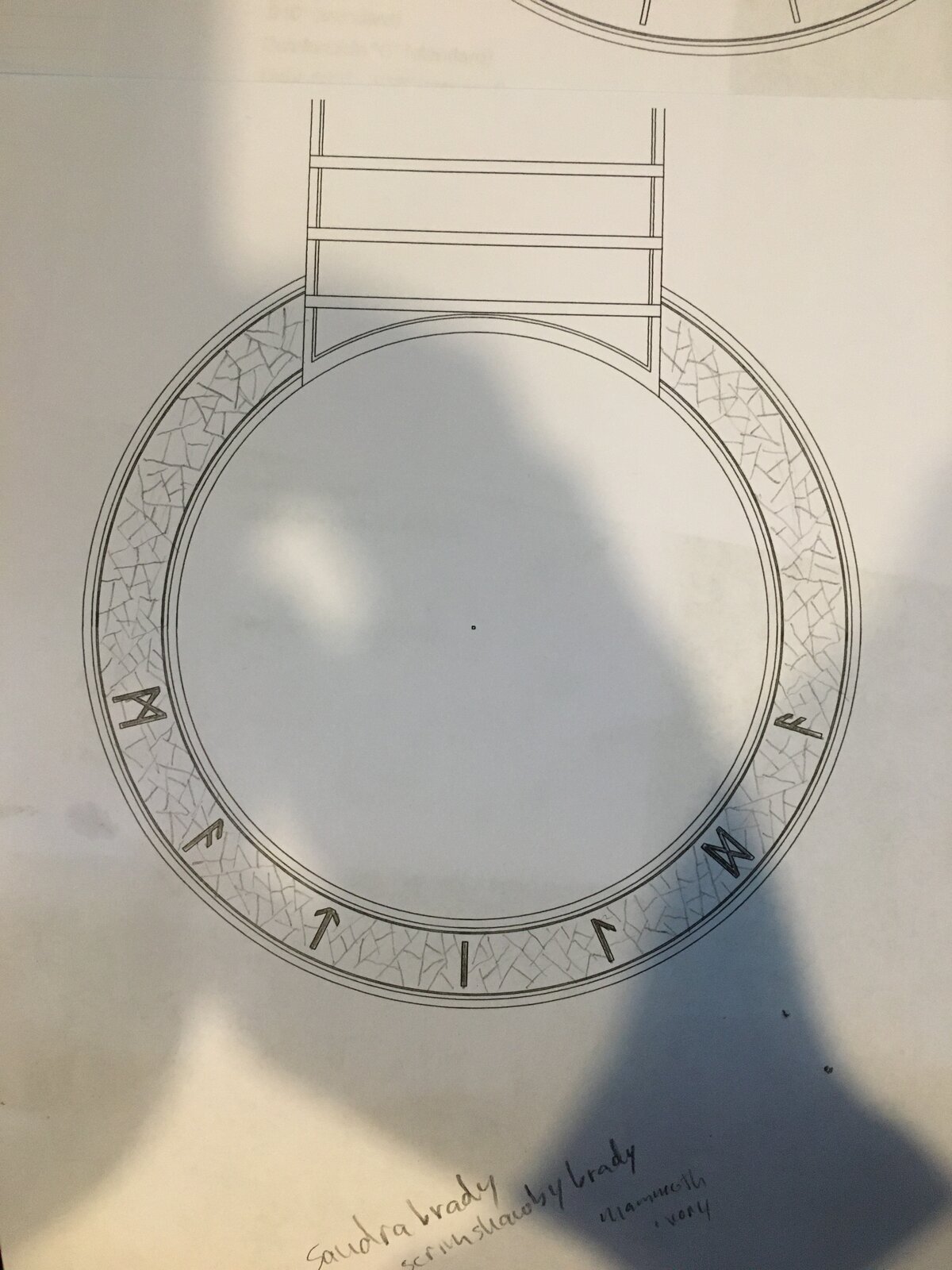 One of Ryan&rsquo;s pencil drafts for the rosette design, with runes around the ring